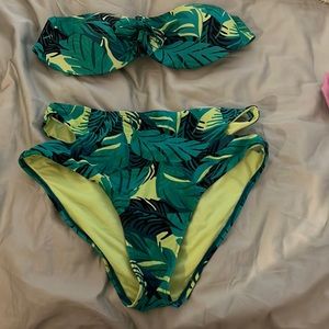 Two piece bathing suit. High waisted cute out sides. Bottom L top M
